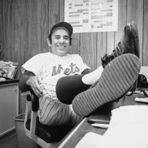 New York Mets Manager Yogi Berra, whose team has a one-game advantage over A's in World Series play, is an obviously happy man in dressing room at New York, on Oct. 18, 1973 after the 2-0 win.     Mets now lead A's, 3 games to 2. (AP Photo)