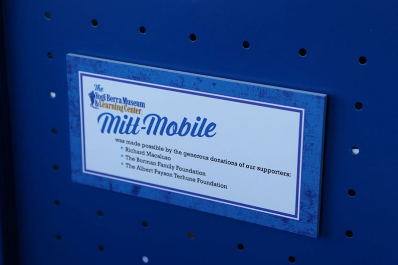 Close-up of supporters plaque on the Mitt Mobile